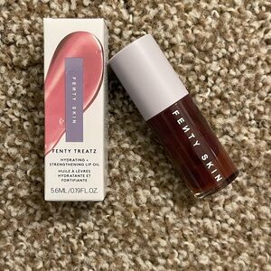 Fenty Beauty Fenty Skin Lip Oil in Deep Berry / Plum Sheer